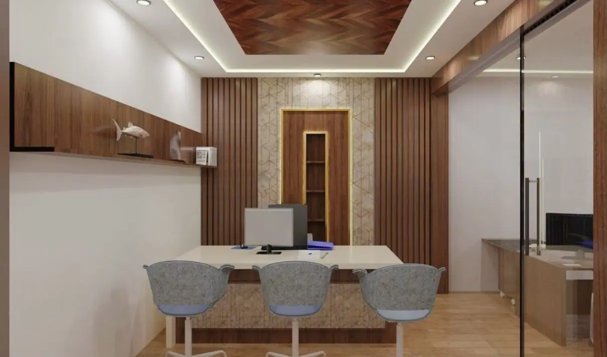 Office cabin with a herringbone timber ceiling panel, slatted walls and a desk with three chairs