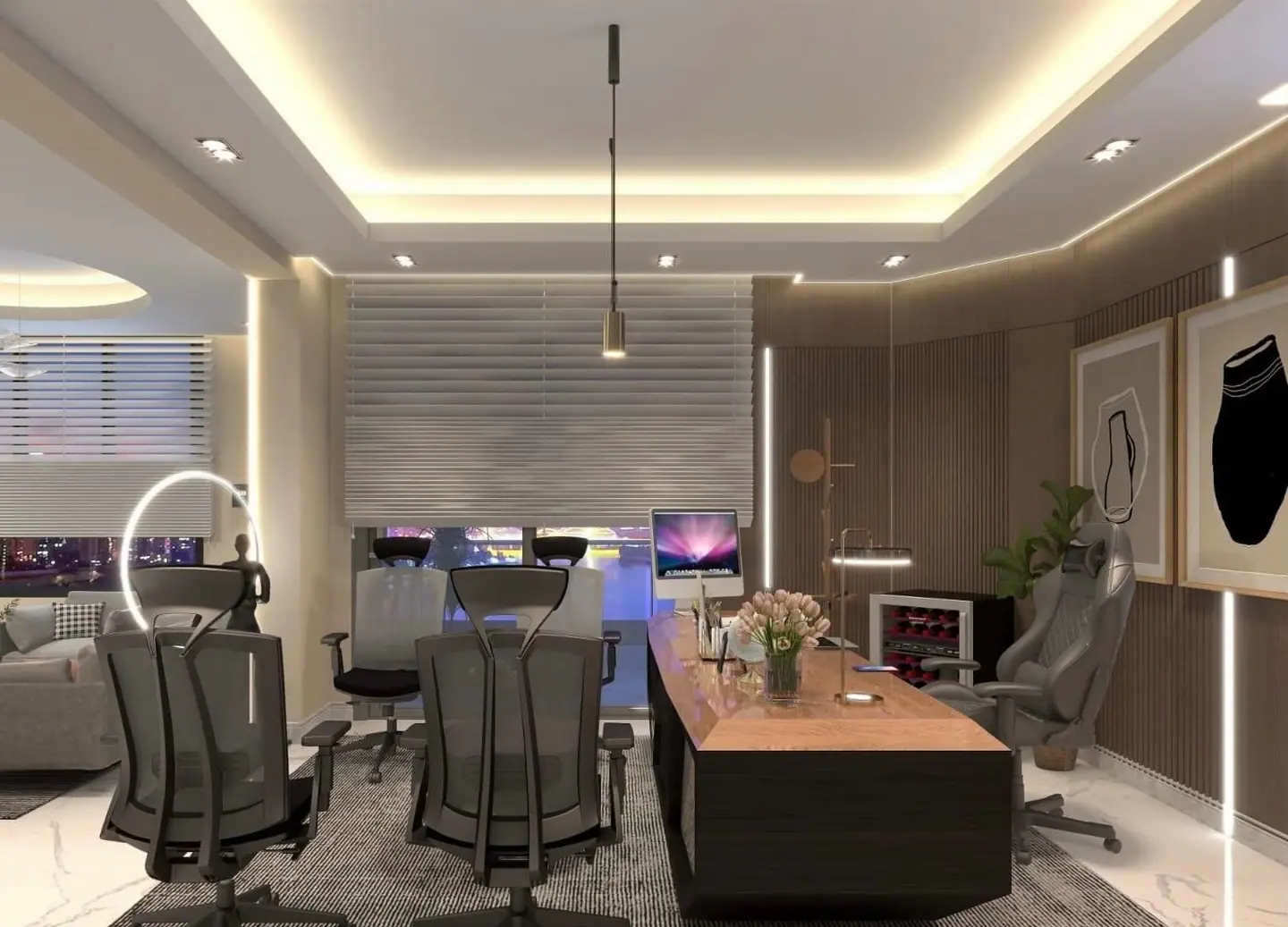 Director’s cabin with an executive desk, a sofa corner and a cove-lit false ceiling