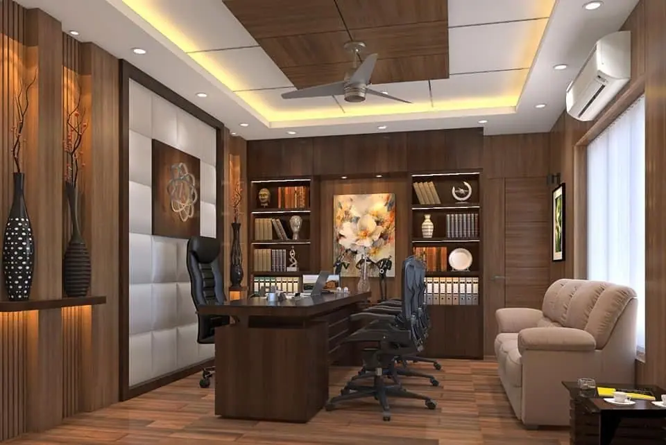 Managing director’s cabin with lit display shelving, a padded feature wall and a sofa by the window