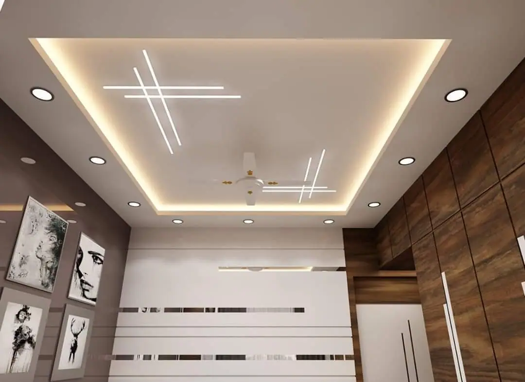 Bedroom false ceiling with a cove-lit border and crossed linear lights