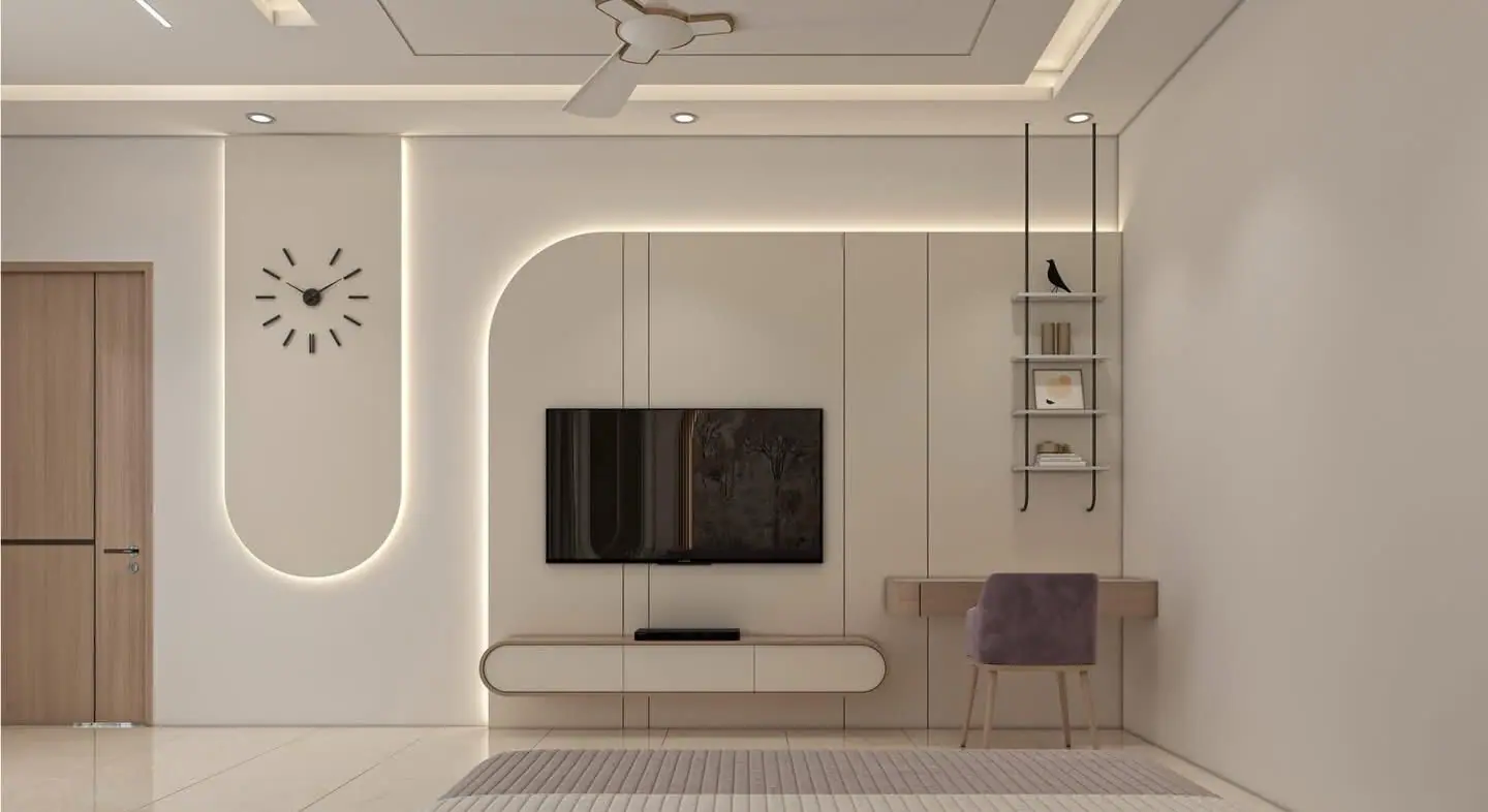 Bedroom design with a curved, backlit TV wall and a study niche